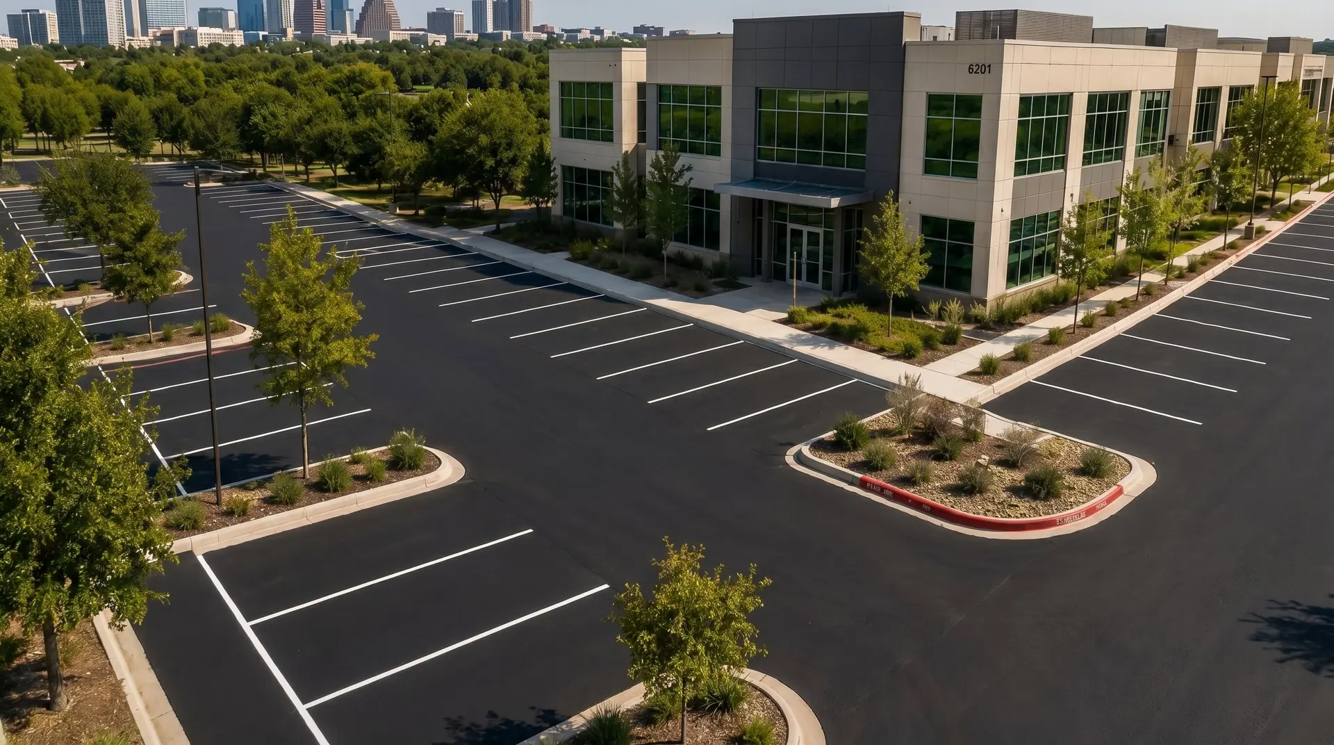 Freshly sealcoated and striped commercial parking lot in Austin